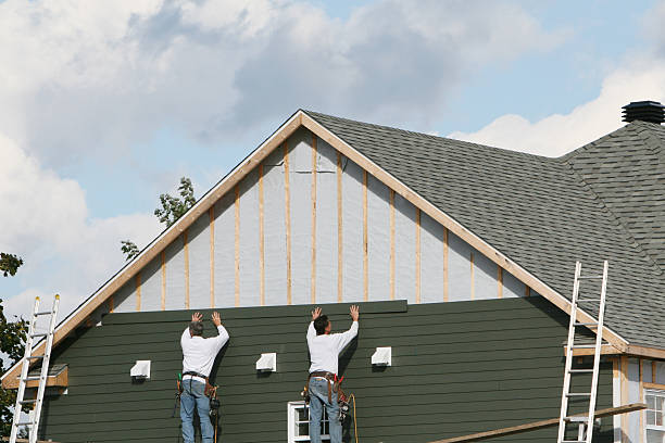 Professional Storm Damage Siding Repair technician working in Campbelltown, PA